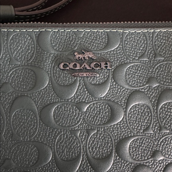Coach Embossed Dark Green Corner Zip Wristlet
NWOT - Picture 5 of 7